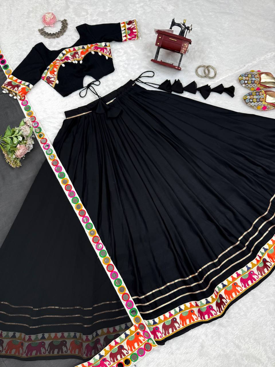 Heavy Rayon Lehenga Choli with Mirror & Tassel Work and Gamthi Lace Dupatta